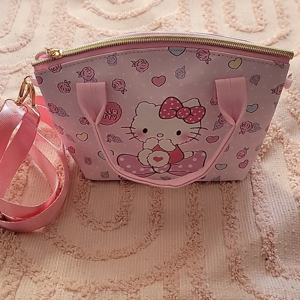 Hello Kitty Handbag with adjustable shoulder strap, pink 💗. NWOT.